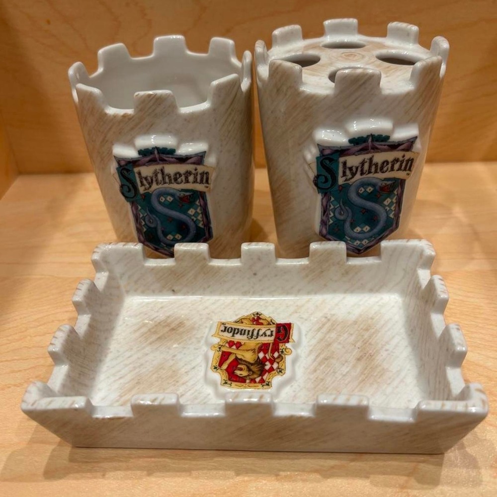 Harry Potter Slytherin and Gryffindor toothbrush holder set with castle design